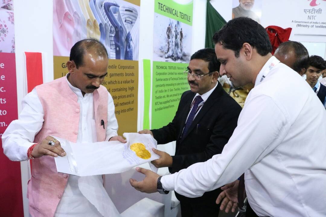 Shri P. C. Vaish, CMD NTCL is sharing the information about quality of NTC products to the Honourable State Minister Shri Ajay Tamta, Ministry Of Textile, GOI during his visit to NTC Stall in Textiles India 2017 fest.